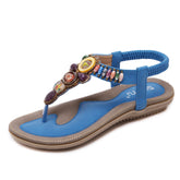 Sandalen mit flachem Absatz und Knöchelriemen